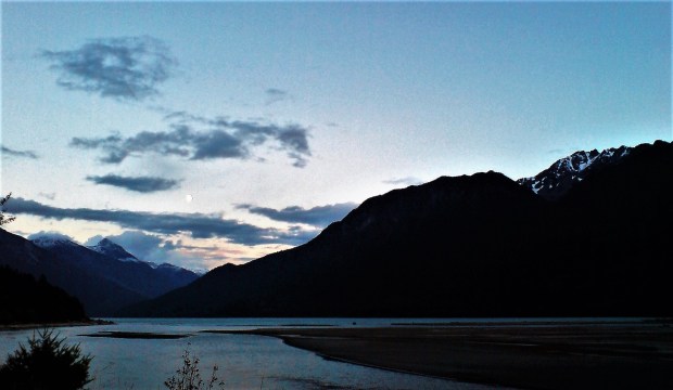 Moon at dusk over Lillooet Lake
